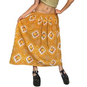Gorgeous yellow skirt with floral rose patterns